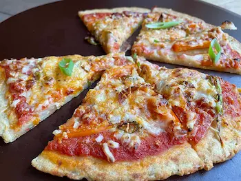 slices of potato crust pizza on a pizza palette